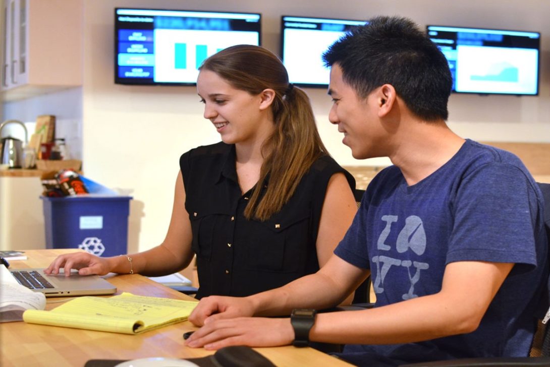 two interns at a worksite